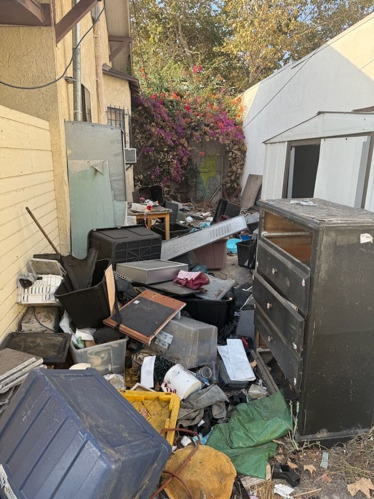 Gallery photos for Expert Junk Removal Transforms Cluttered Alley: Image #1