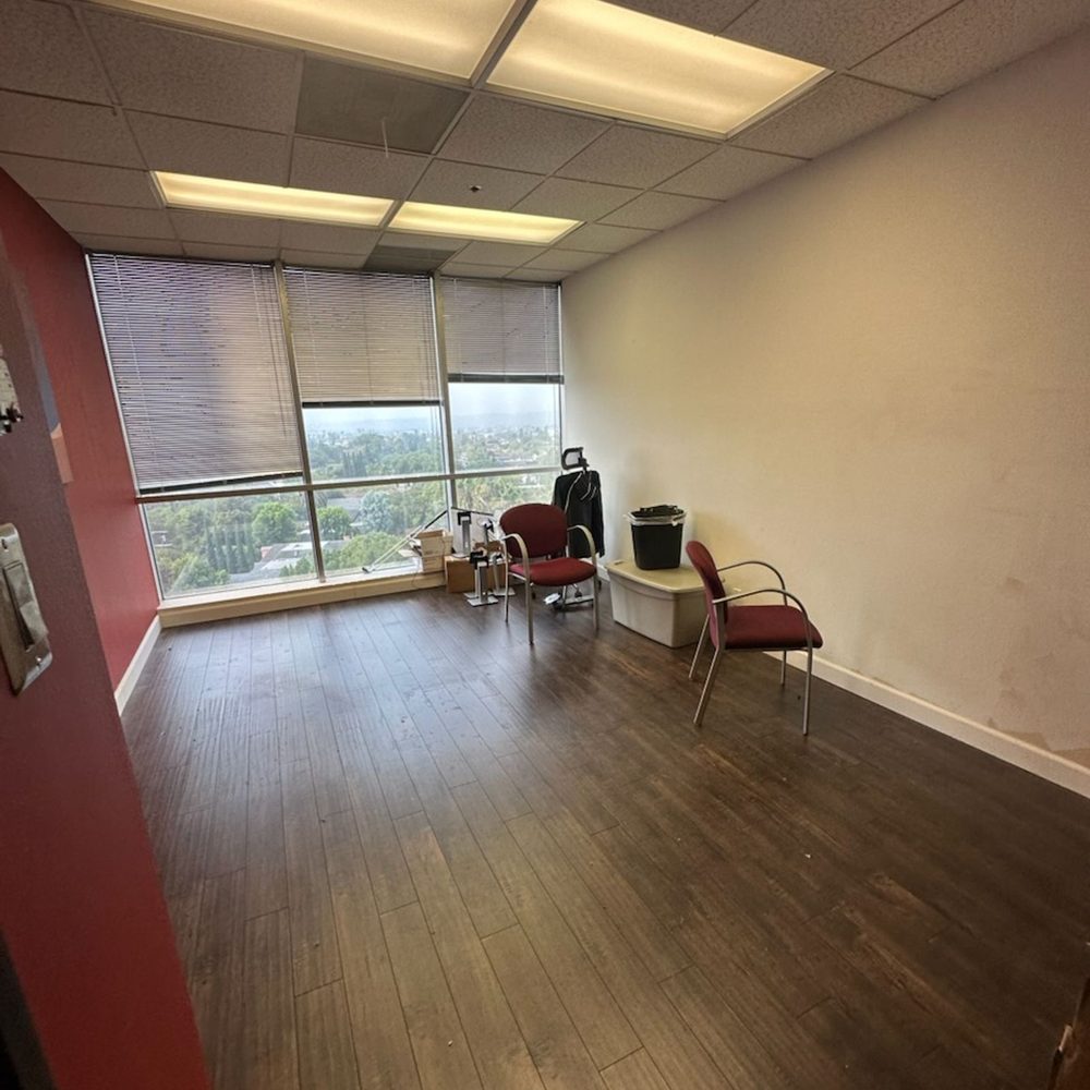 Office chairs left in an empty suite during a commercial clean out