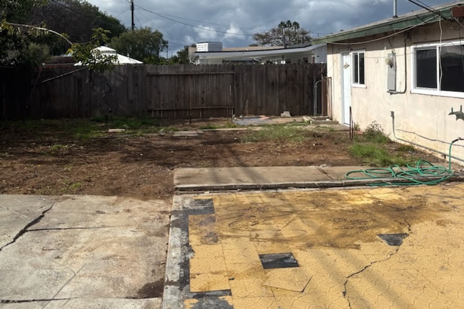 Backyard shed footprint cleared after removal